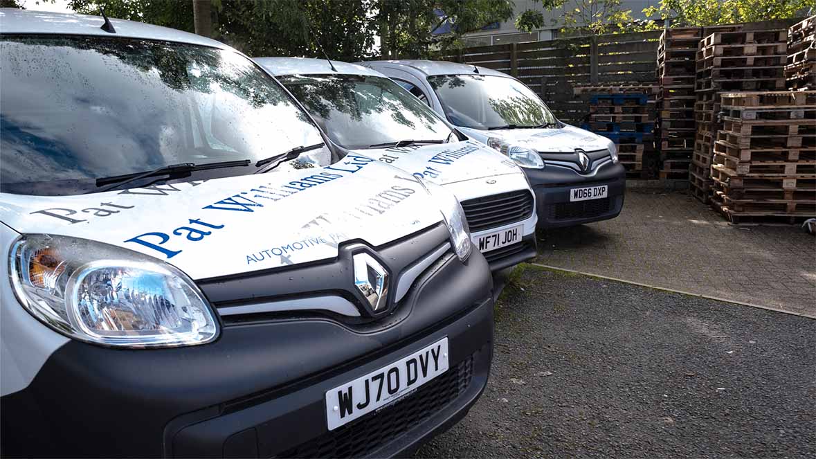Car part delivery vans parked at Pat Williams in Barnstaple North Devon